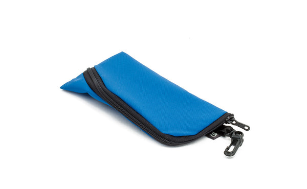 A Small Ghost Whale Pouch in Island (bright blue).